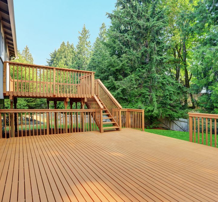 A wide composite deck built for two floors of the house